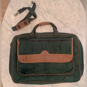 Vintage Eddie Bauer soft suitcase in classic forest green with tan leather trim